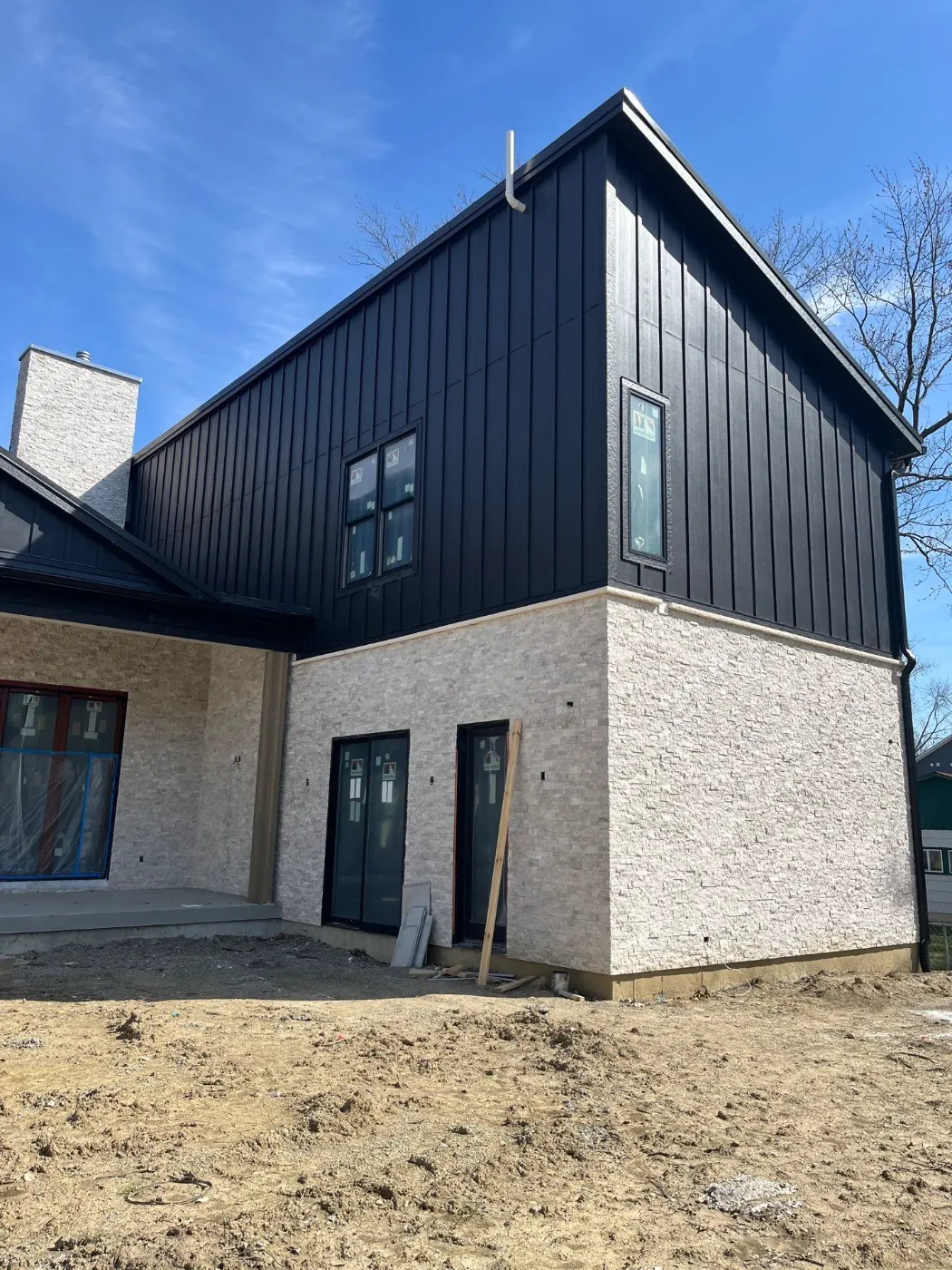 Tarping and dry-in on a Aberdeen Bend commercial roof
